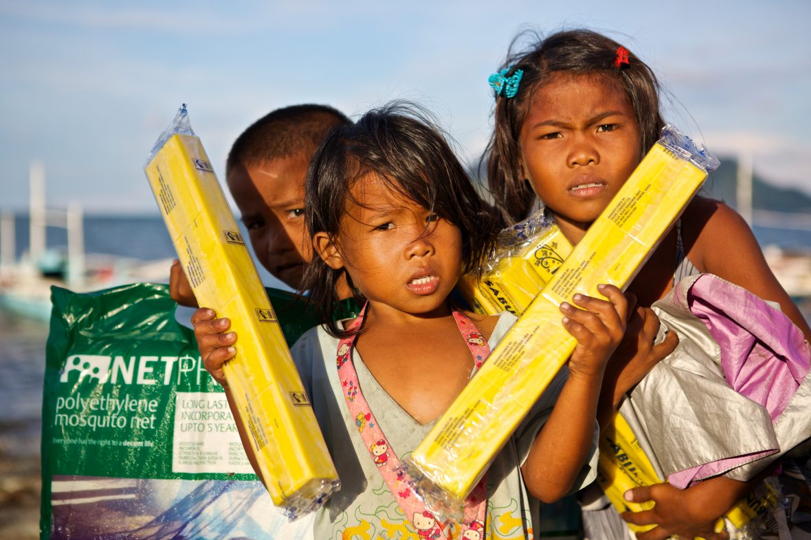 Kids holding non-food items