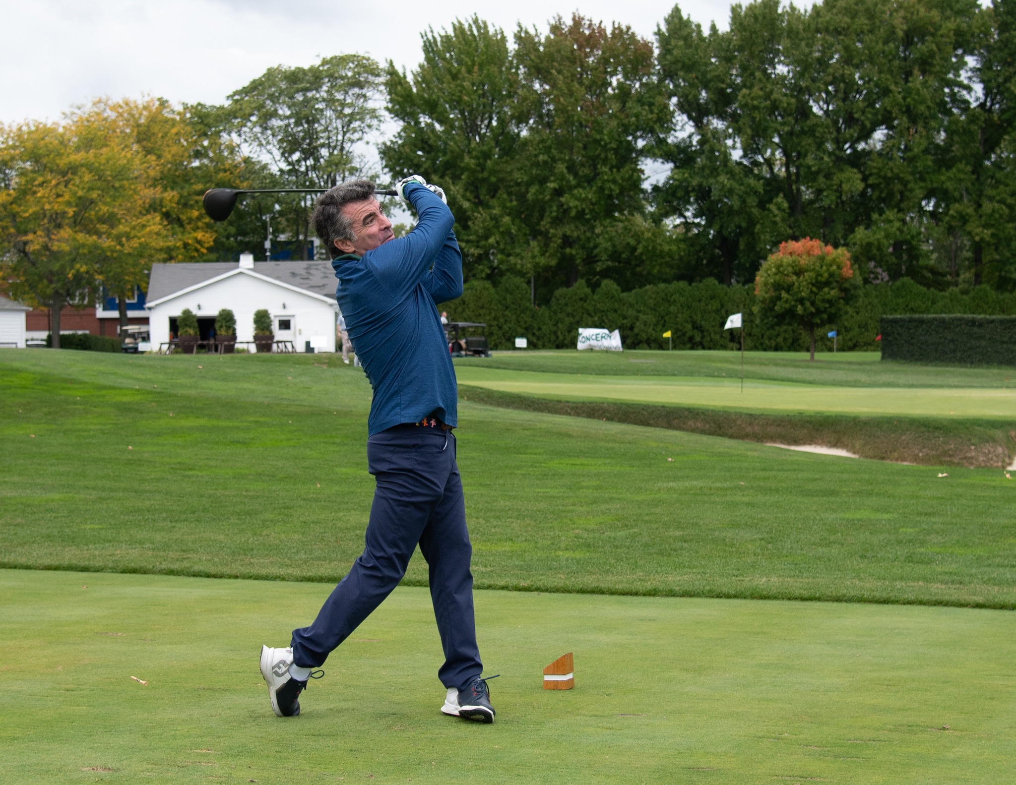 A golfer mid-swing