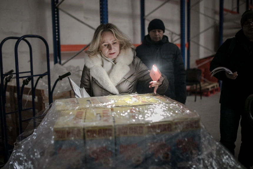 A Concern team member inspects food supplies that have arrived in western Ukraine.
