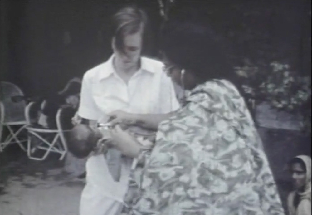 nurse with malnourished child in 1970s Bangladesh
