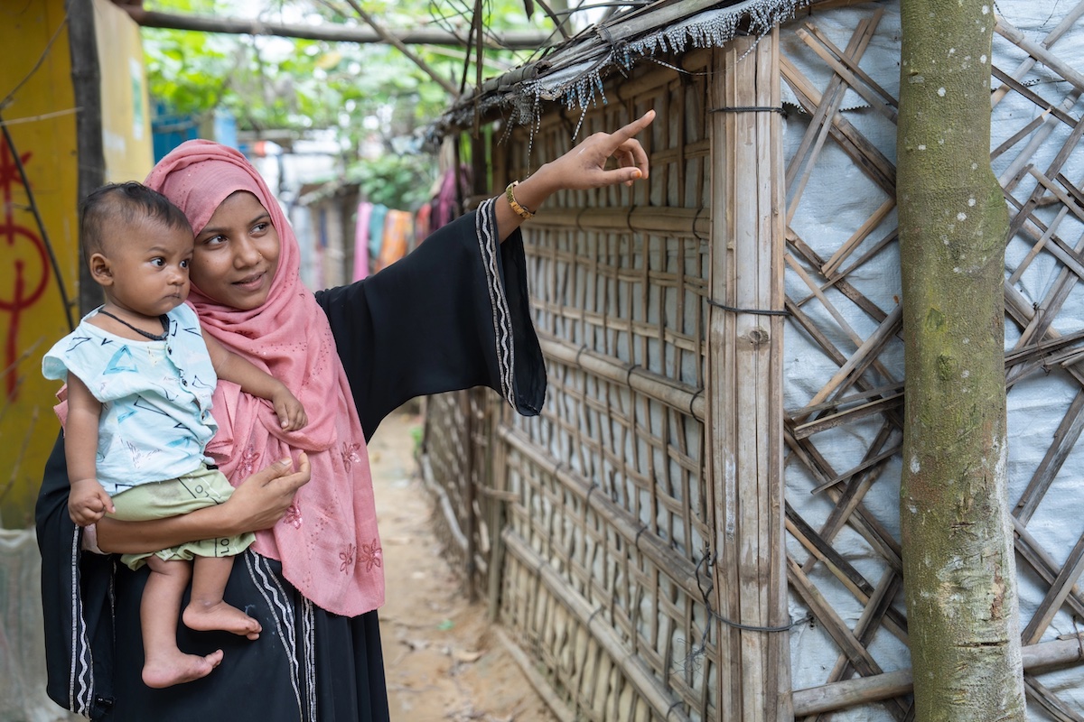 Yasin* with his mother Halima*. After recovering from moderate acute malnutrition, Yasin continues to receive supplemental nutrition support to continue his healthy growth and development.