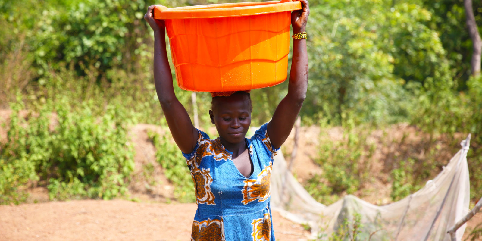 A woman carries water from a Concern-constructed water point at Boyali in Central African Republic.