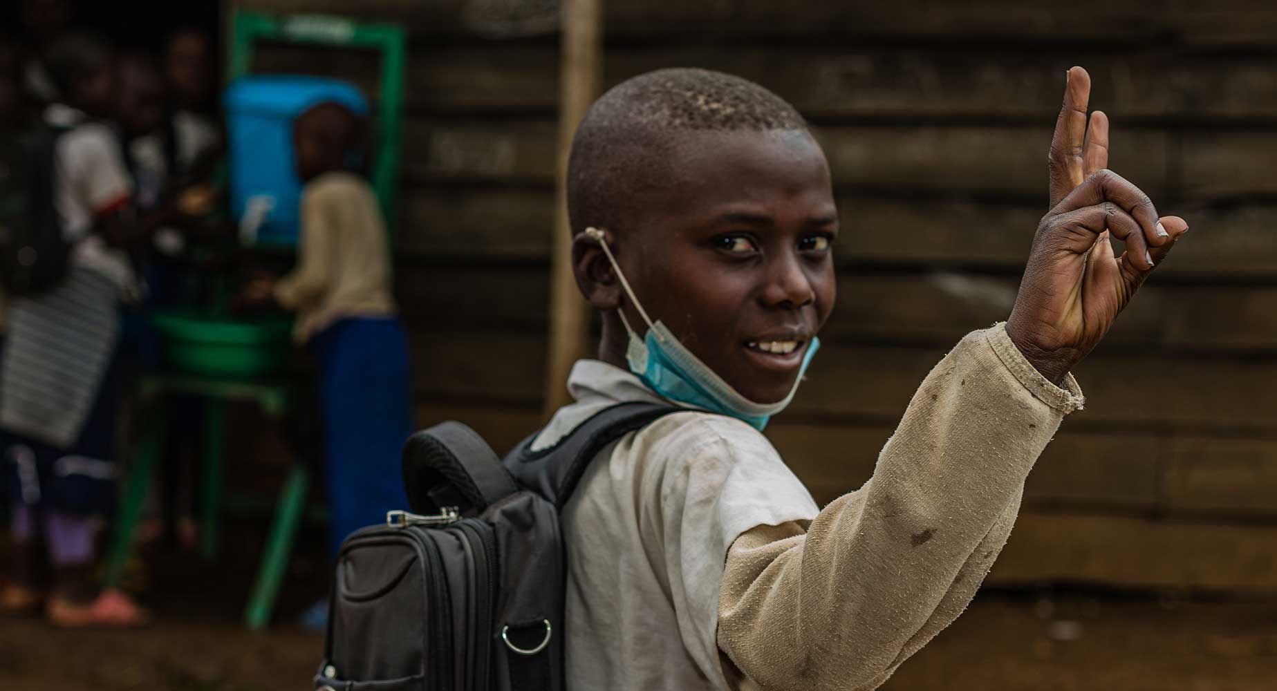 A boy attends school in the conflict-torn DRC. 