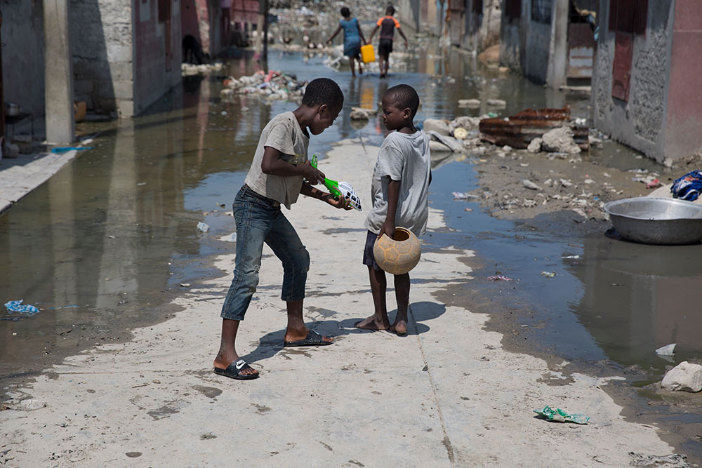 Two boys play in Port au Prince Haiti