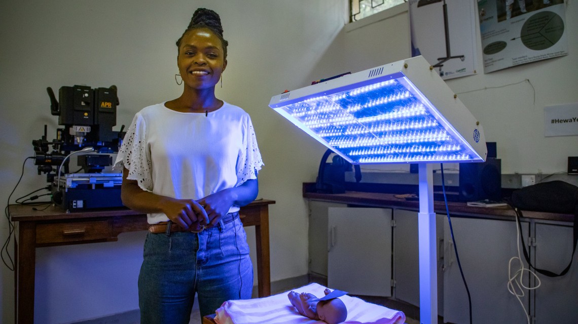 Kista Mbula, Communications Officer and Innovator, introducing the Maker Space photo therapy unit design. Photo: Gavin Douglas / Concern Worldwide.