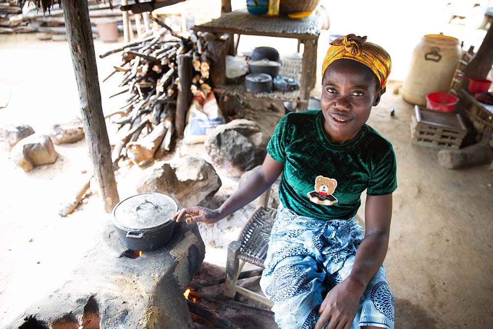 A woman in Liberia with an eco-stove