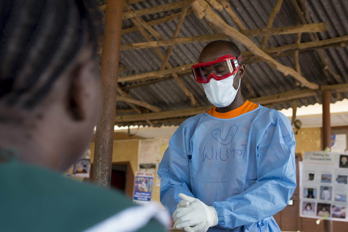Infection prevention and control (lPC) training for staff at Lumpa Health Center, Sierra Leone. Concern led these trainings across more than 200 health clinics in the area as part of a larger Ebola response during the 2014-16 epidemic. (Photo: Kieran McConville/Concern Worldwide)