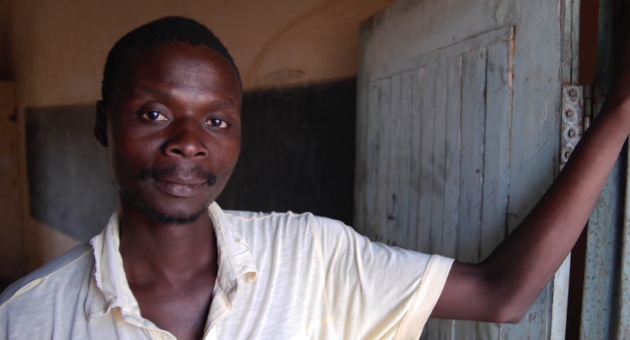A Malawian farmer and head of the Dinyero village's father's group, which works to keep girls in school