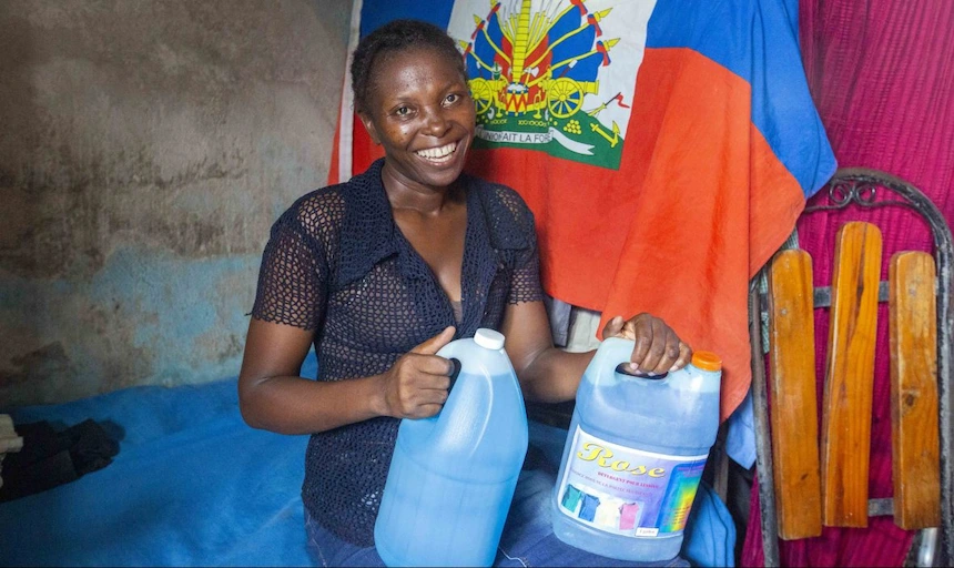 Haitian woman with liquid soap