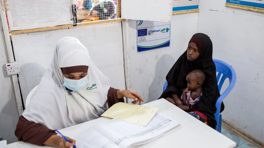 Naima* consults with a nutritionist at a maternal and child health centre in Somaliland