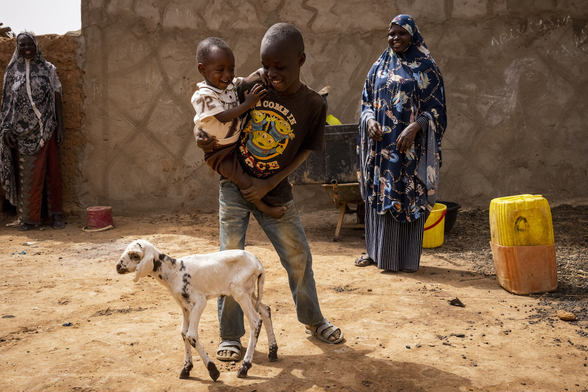 Nafissa Aboubacar (27) with her baby son Soufiane Kassoum (17 months old) and her eldest son Ishak (10) at their home in Tahoua. (Photo: Ed Ram/Concern Worldwide)