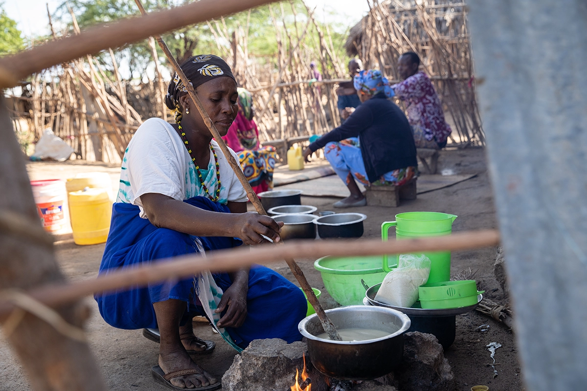 Mwanajuma Ghamaharo prepares breakfast outside her home in Makere village in Tana River County. (Photo: Lisa Murray/Concern Worldwide)