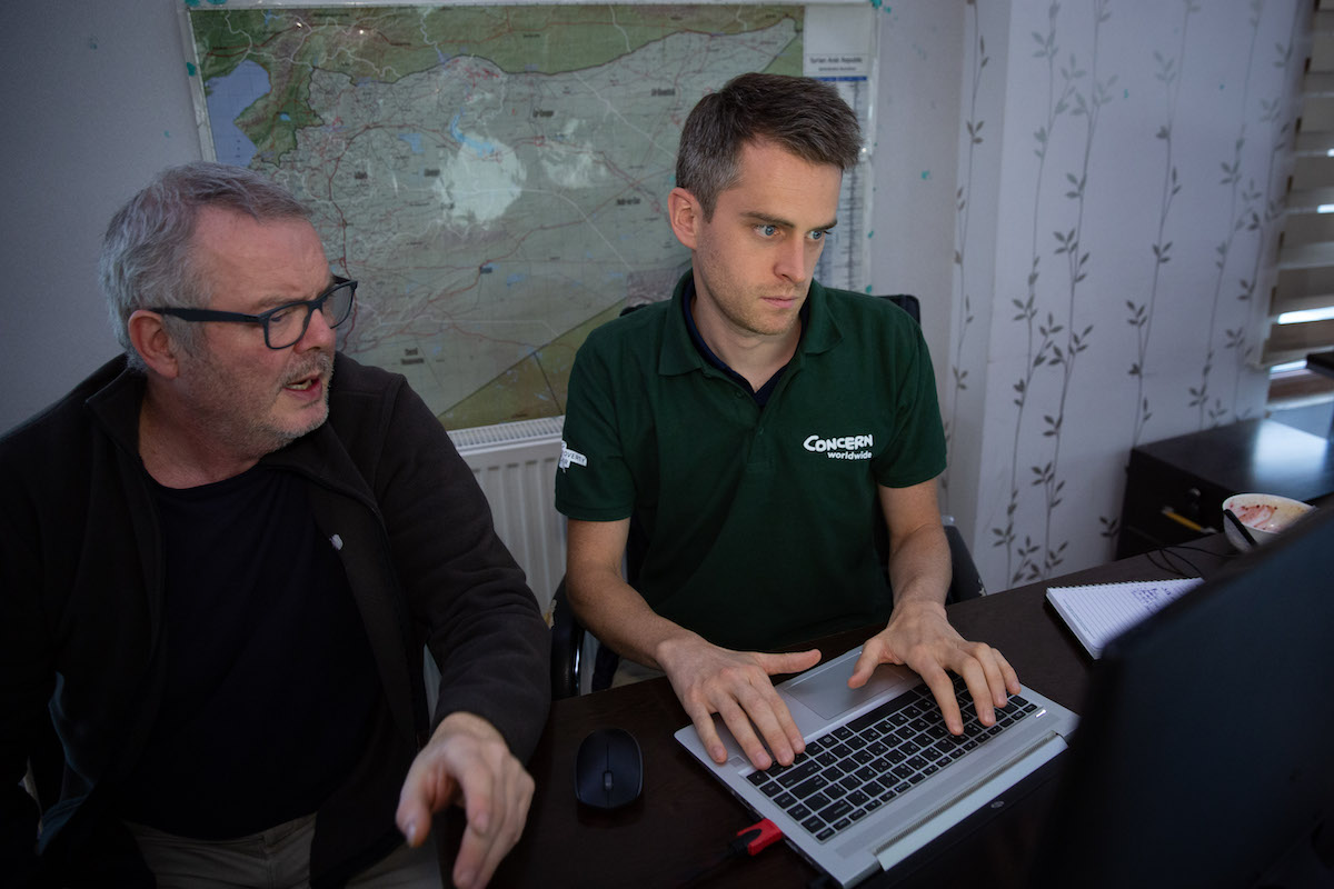 Concern’s Paul Carr works on a grant proposal for the Türkiye-Syria earthquake with Head of Emergency Ops, Ros O'Sullivan. (Photo: Kieran McConville/Concern Worldwide)