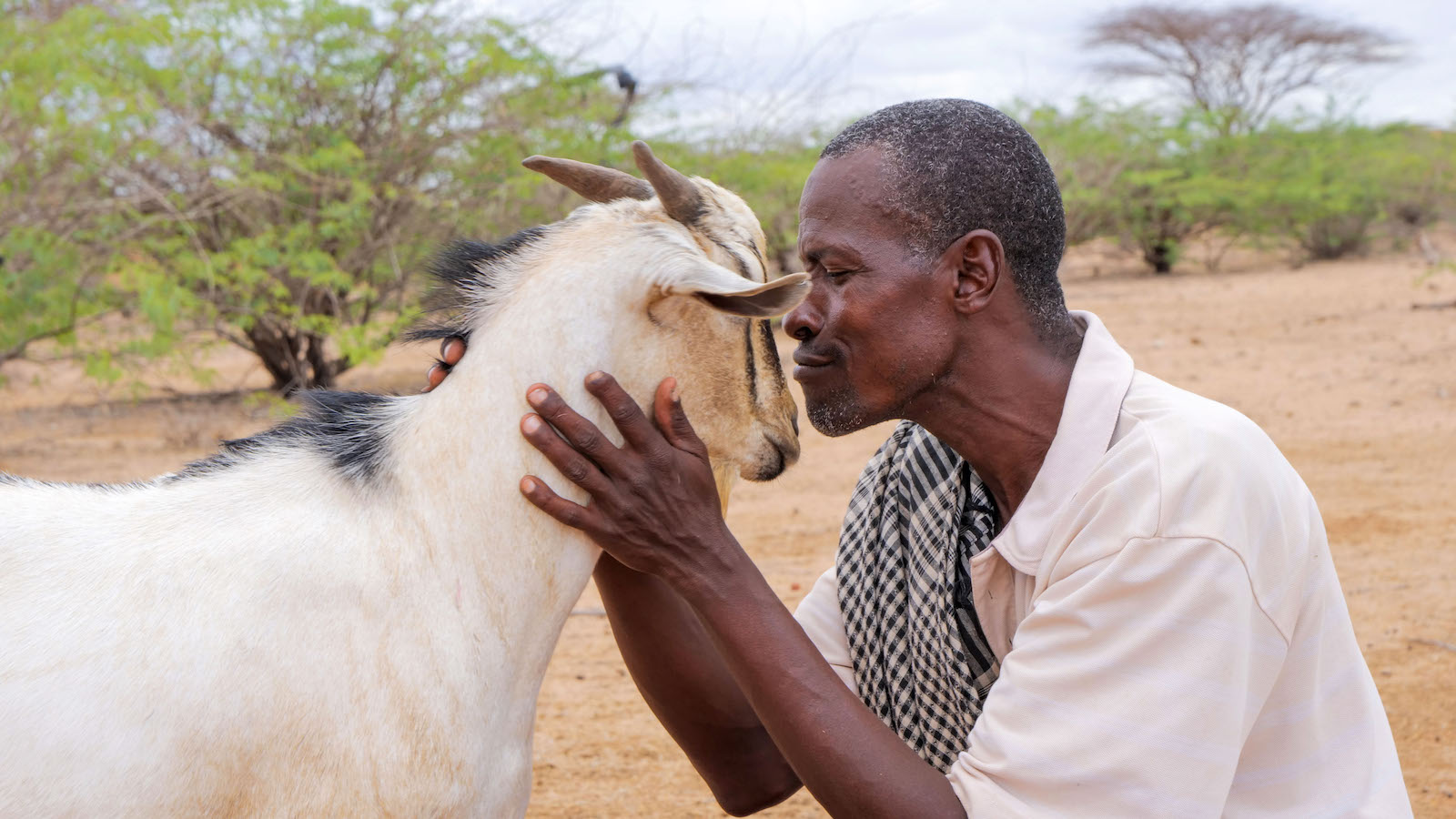 Hassan Boya, a farmer in Matagala, Tana River with one his many goats. (Photo: Eugene Ikua/Concern Worldwide)