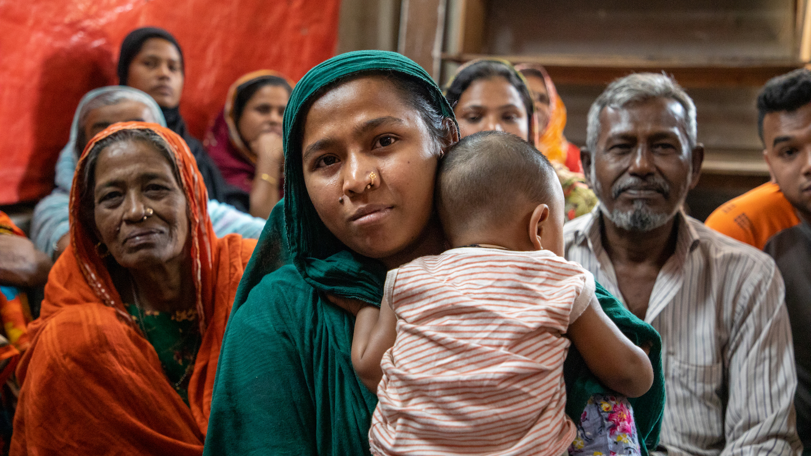 Nasima (32) and her baby Samiul (18 months). In Dhaka, the City ‘Sweeper’ Colony have just started the newly introduced Green Graduation programme. This group suffer from lack of consistent work which stems from prejudice of the group as a whole. There are a thousand families in this group. During Covid, they received no help. Photo: Gavin Douglas/ Concern Worldwide