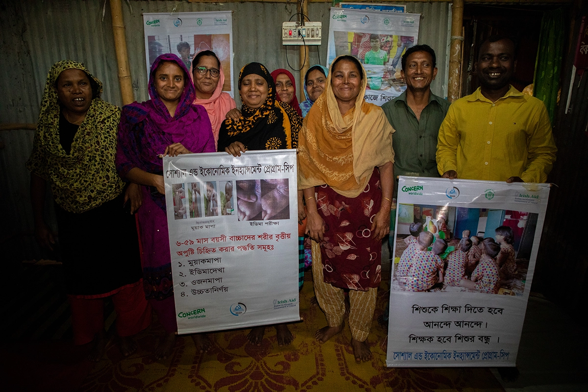 Posters to raise awareness on gender equality and domestic violence prevention are hung up in Dhaka by the concern-supported Changemaker group. (Photo: Gavin Douglas/Concern Worldwide)