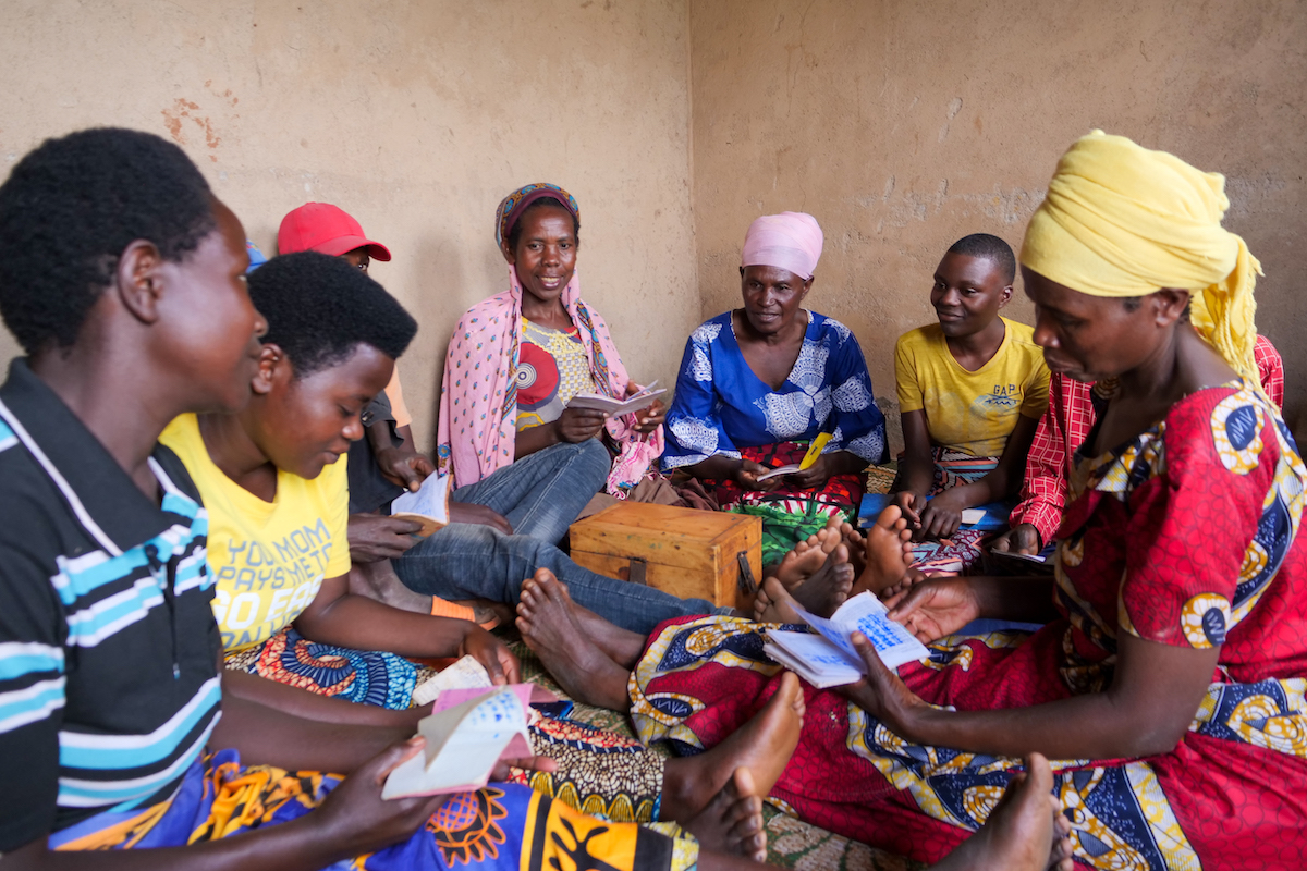 Bernadette Katungu Kamatogha (center right, in pink head scarf) with her local VSLA. (Photo: Eugene Ikua/Concern Worldwide)