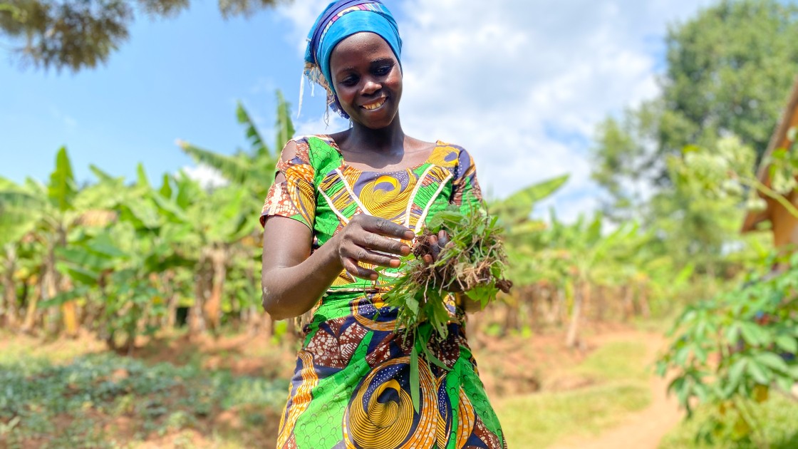 Mother-of-three Beatha Uwitonze (33), tends to her home garden in Muganza, Gisagara. She is president of two farmer field associations through Concern Rwanda's Green Graduation program. Photo: Eugene Ikua/Concern Worldwide