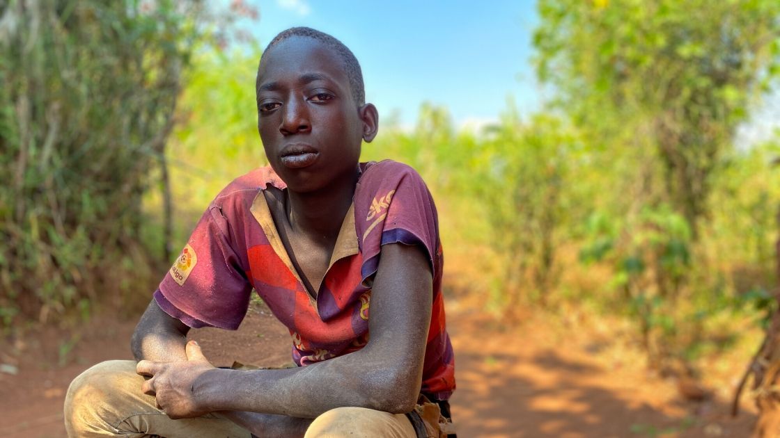 Theogene Niyogisubizo (16) cares for his 12-year-old brother after they were left to live on their own eight years ago. (Photo: Eugene Ikua / Concern Worldwide)