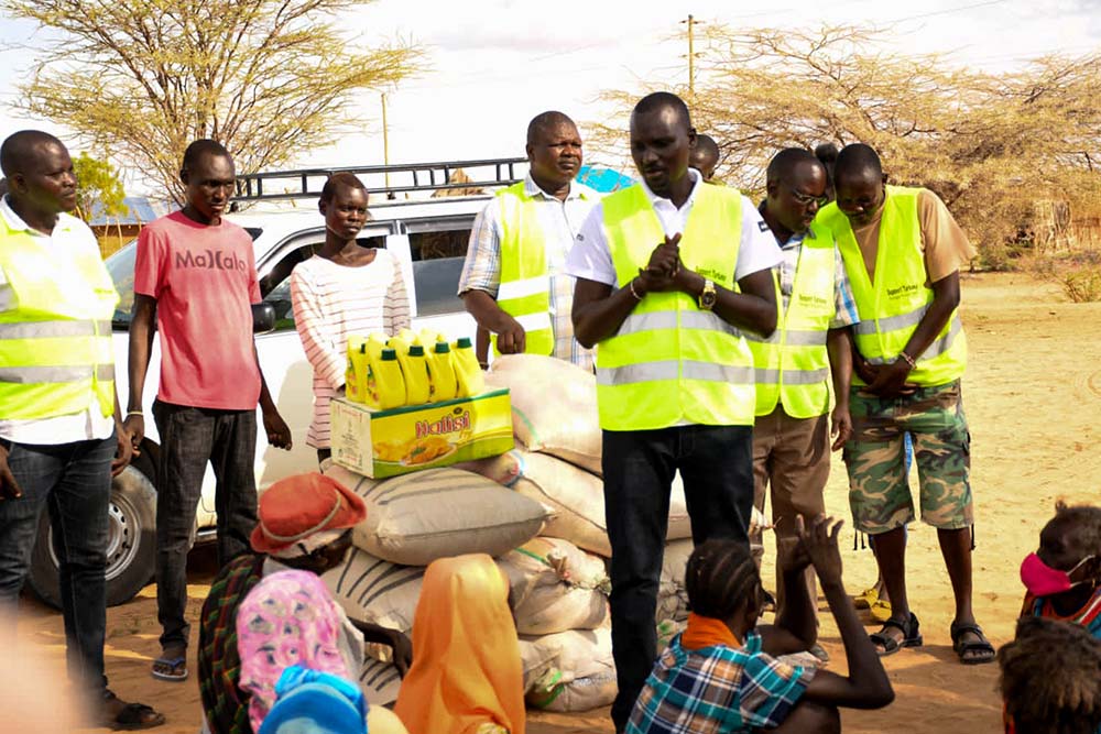 Concern Worldwide staff at a distribution of supplies in Northern Kenya