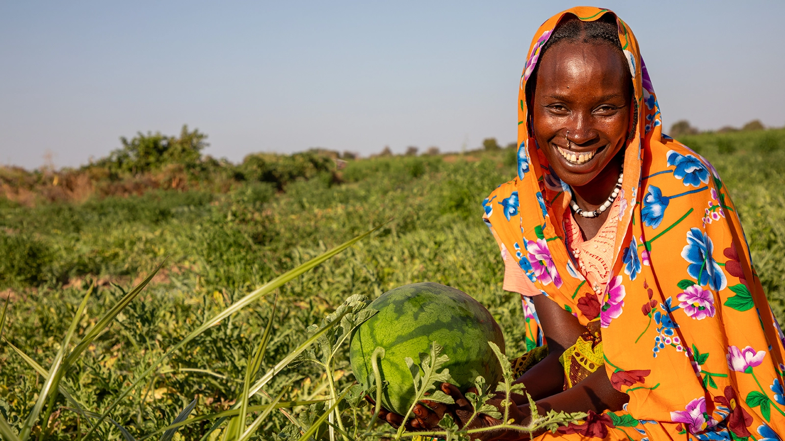 Mahadia Gamar (24) showcases her watermelon at her farm in Karo village, Chad. (Photo: Eugene Ikua/Concern Worldwide)