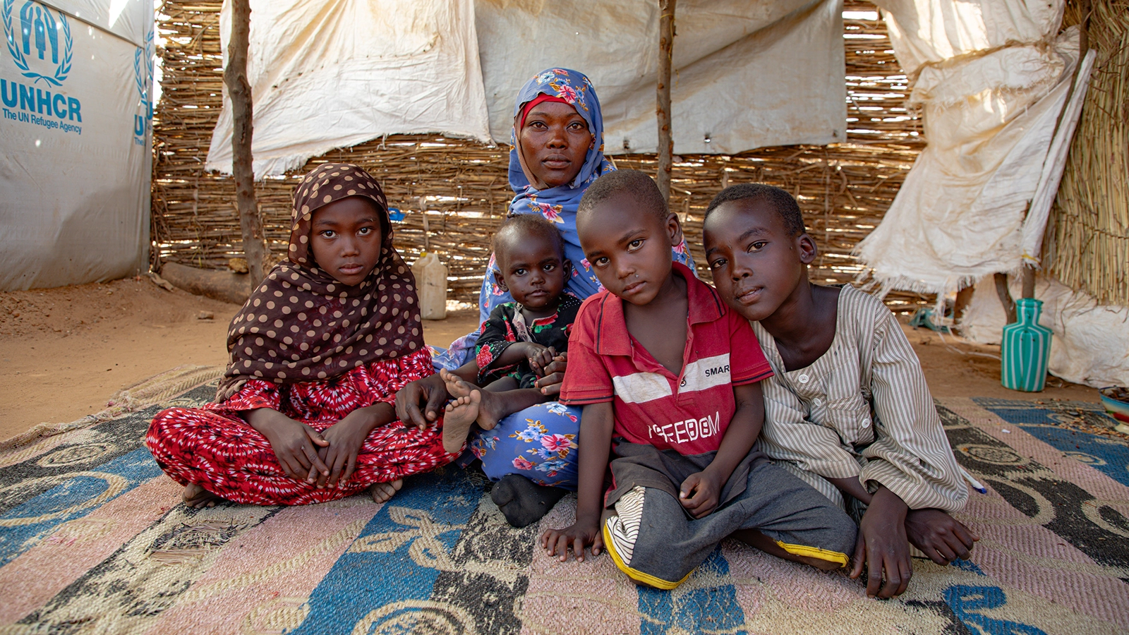 Hamila* (27) with her children in refugee camp in Eastern Chad. From left: Zara* (7), Rawa* (22 months), Murad* (5) and Yakub* (11). Photo: Eugene Ikua/Concern Worldwide