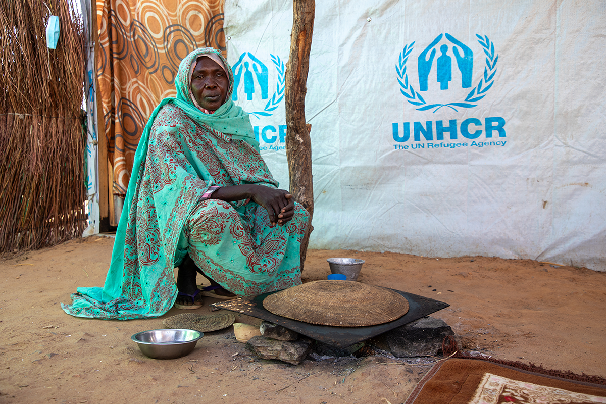 Fatima* preparing kisra bread, which her children sell at the camp for income. (Photo: Eugene Ikua/Concern Worldwide)