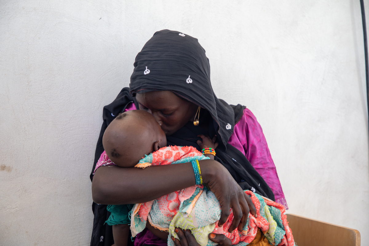 Fanta Kewbi (25) consoles her daughter Yakoura Ngay (8 months) at the Concern health post in Baga Sola, Western Chad. (Photo: Eugene Ikua/Concern Worldwide)