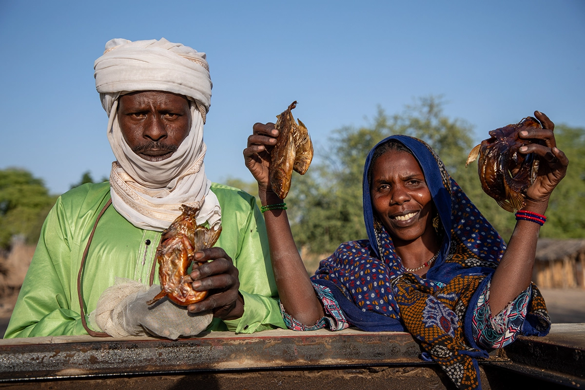 Hawa (right) with the vice-president of her fishing association, Alhadji Mohammad. The association was launched as part of the Concern-led program Chronic Humanitarian Crisis. (Photo: Eugene Ikua/Concern Worldwide)