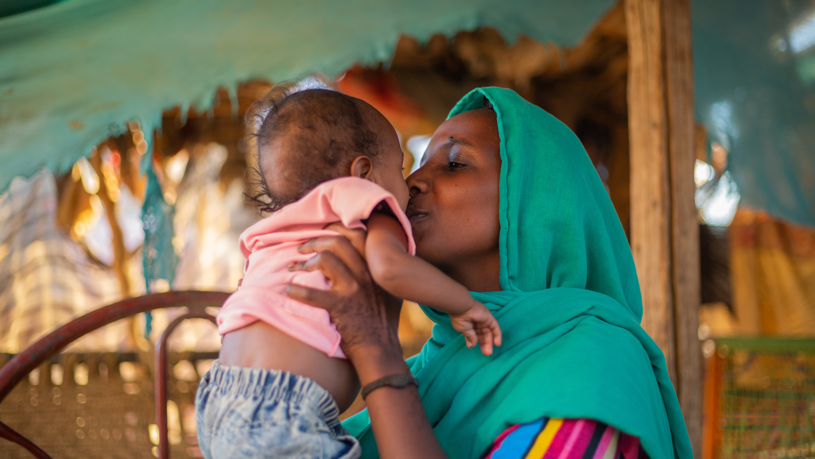 Malaz feeds her two-year-old Aida ready-to-use-therapeutic food at her home in Kassala State. (Photo: Ahmed Elfatih Mohamdeen/UNICEF)