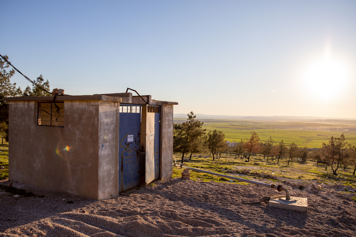WASH Officer Shahnas visits a Concern-funded water pump in Duhok, Iraq. Photo: Gavin Douglas/Concern Worldwide