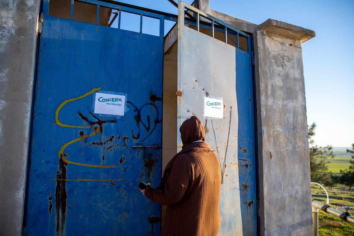 WASH Officer Shahnas visits a Concern-funded water pump in Duhok, Iraq. Photo: Gavin Douglas/Concern Worldwide