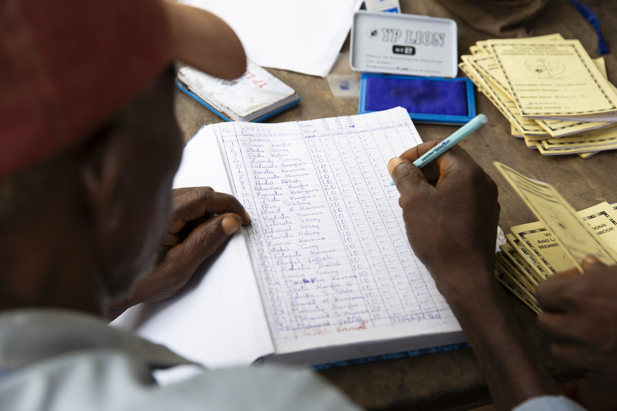 Scenes from a VSLA meeting in Sierra Leone. (Photos: Kieran McConville/Concern Worldwide)