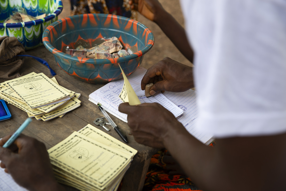 Scenes from a VSLA meeting in Sierra Leone. (Photos: Kieran McConville/Concern Worldwide)