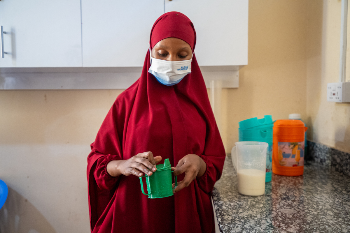 A Concern health worker prepares therapeutic milk at the stabilization center at Banadir Hospital, near Mogadishu. (Photo: Mustafa Saeed/Concern Worldwide)