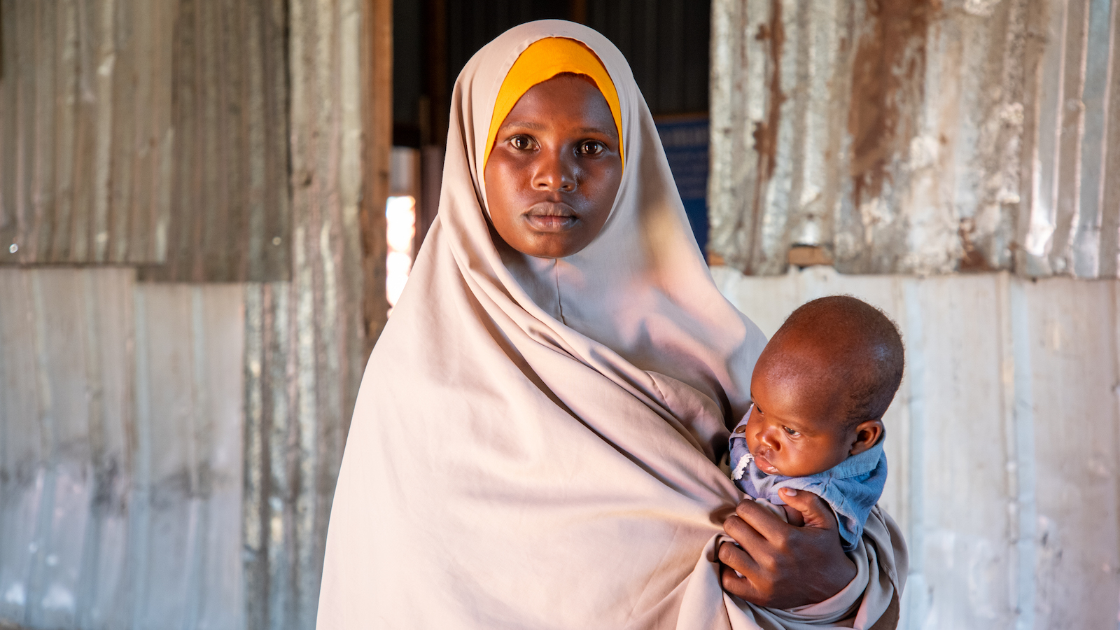 Khadra*(25) is a mother of five children living in Kaxda refugee camp. They moved to this camp due to conflict, drought and and lack of water. Photo: Mustafa Saeed/Concern Worldwide