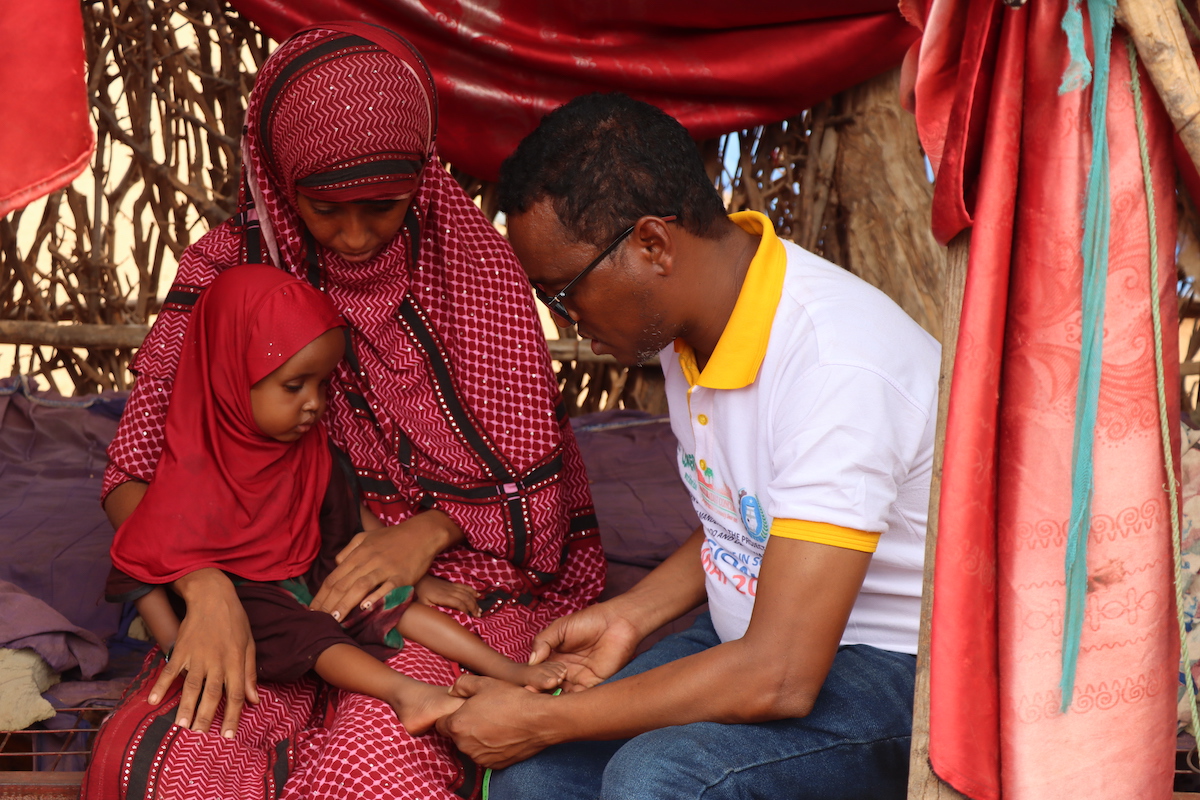 Nurto Mohamud Mohamed's daughter, Anfa Mohamed Hassan, receives a nutritional screening in Ethiopia as part of the Hanaano program.