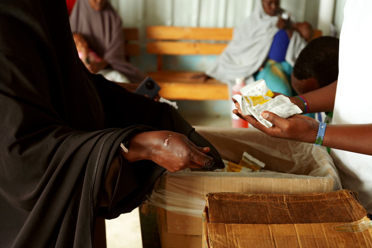 Ready-to-use therapeutic food (RUTF) is distributed at a health facility in Sinka-dheer, Somalia, supported by Concern Worldwide. Essentials like this treatmeent for malnutrition are harder to get into areas where the need is highest due to access and funding issue. Photo: Concern Worldwide