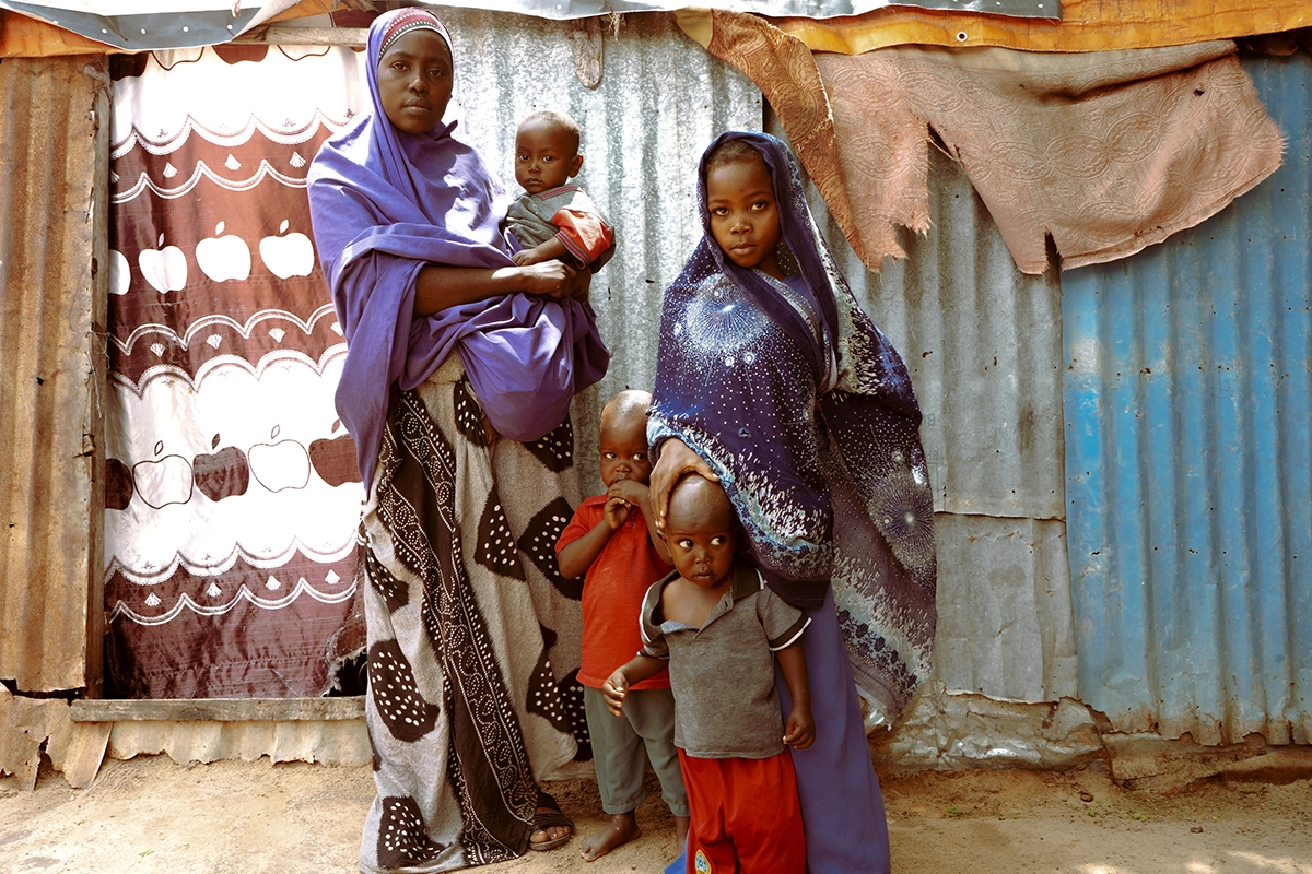 Amburo* (28) is a mother of four children from Baidoa, now living in a displacement camp in Daynile District, Mogadishu. Amburo and her family fled their farm near Baidoa due to severe drought and took on the perilous journey to Daynile District. (Photo: Adnan Mohamed/Concern Worldwide)