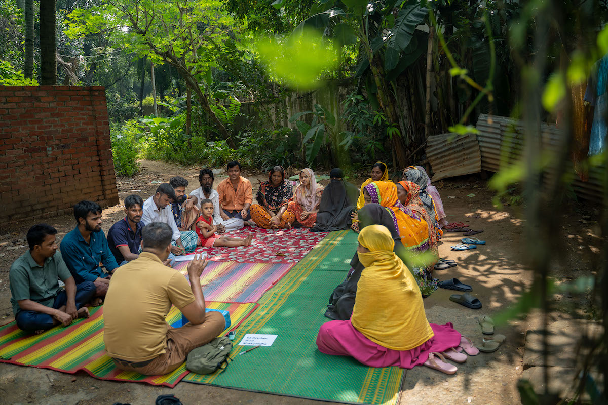 A self-help group meeting in Mirpur led by Graduation mentor Sajeul Islam. This meeting focused on educating members amid a growing dengue outbreak.