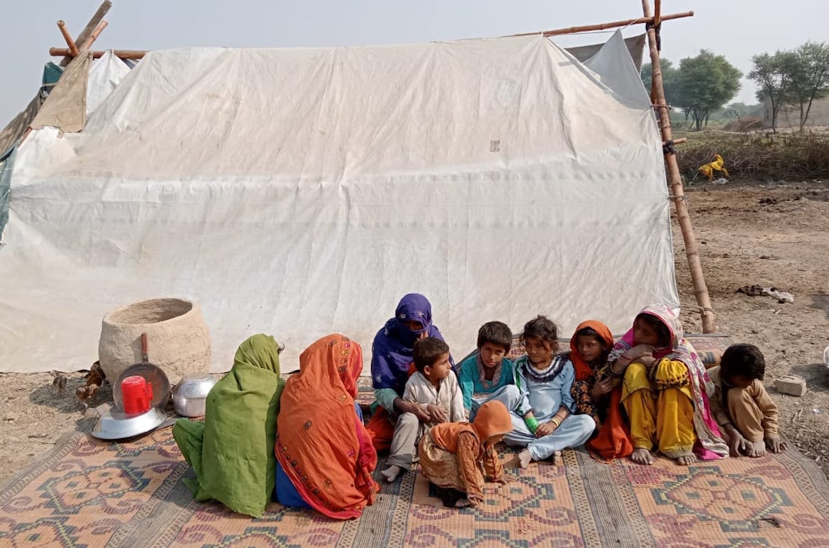Left: Zewar Mai and Talib Hussain lost their home and belongings in the 2024 Pakistan floods. They received a shelter kit and other essentials from Concern. (Photo: Concern Worldwide)