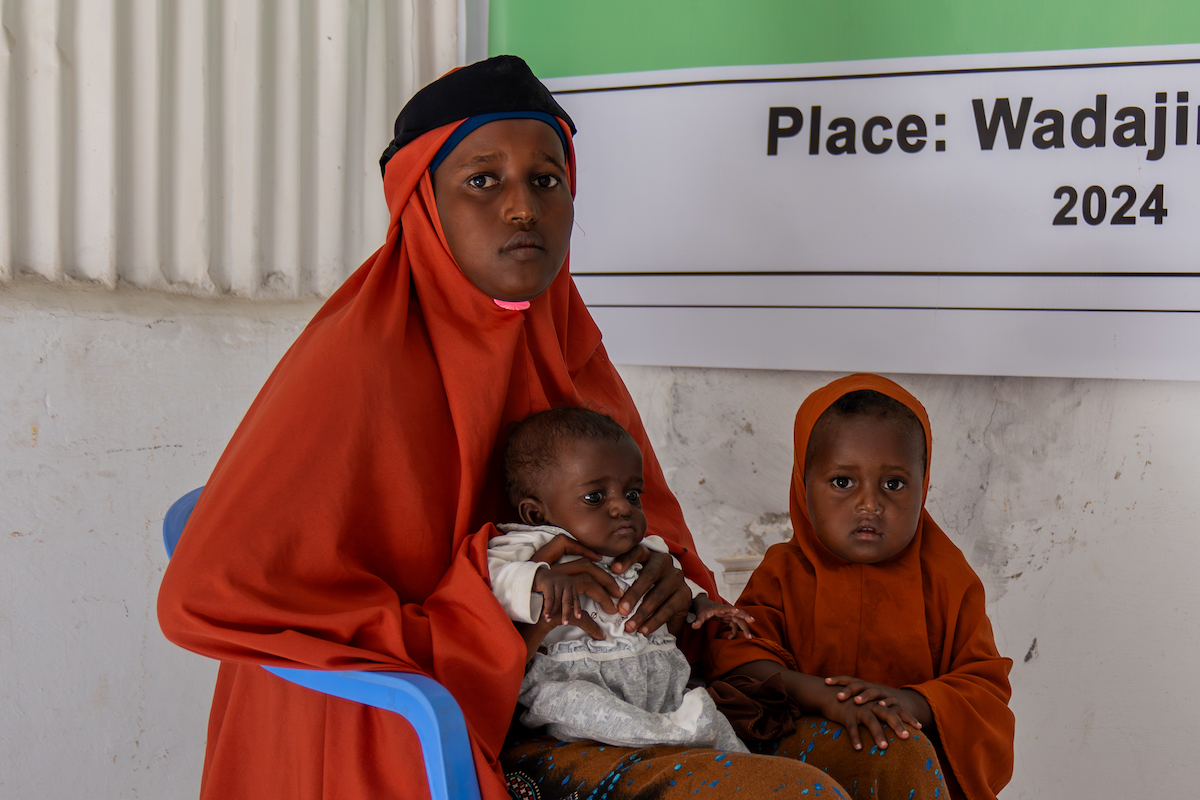 Naima* with six-month-old Leyla* on her lap and two-and-a-half-year-old Jamilah*. (Photo: Eugene Ikua/Concern Worldwide)