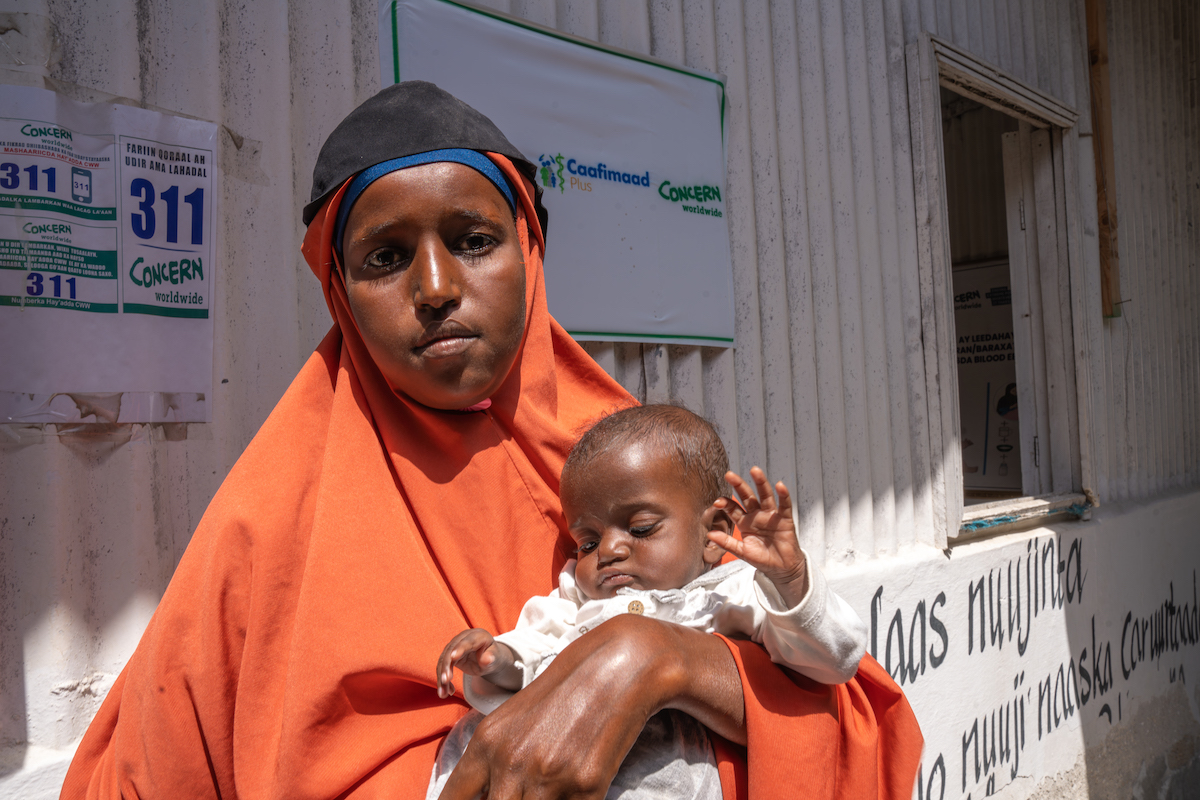 Naima* (22) is married with two young daughters: Jamilah* who is 2 years and 8 months old, and Leyla* who is 6 months old. She and her daughters currently in Wadajir District, Banadir Region, after fleeing violence and drought at home. Photo: Eugene Ikua/Concern Worldwide