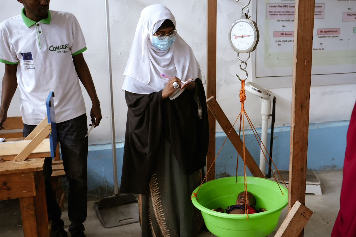 Eight-month-old Anas* is screened at Siinka Dheer. (Photo: Adnan Mohamed/Concern Worldwide)