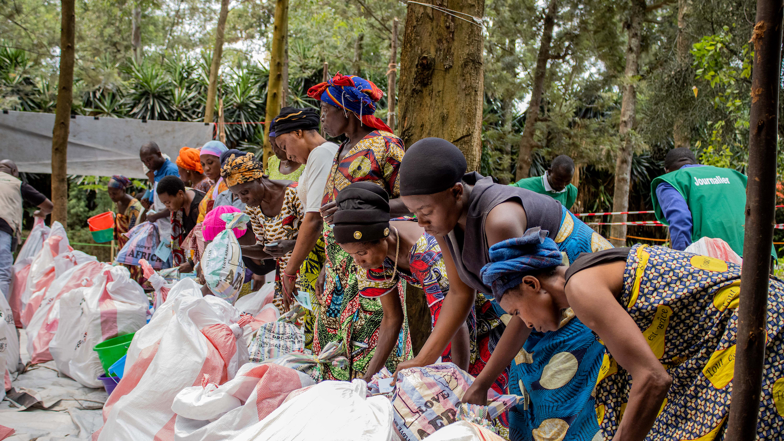 Participants in the SAFER program collect the household and hygiene kits from Concern at the Kirotshe distribution site. (Photo: Concern Worldwide)