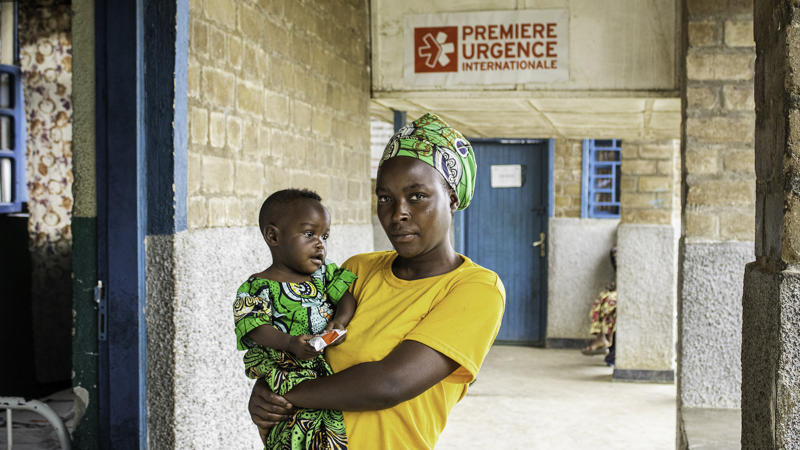 Marie* (28), mother of Celéstin* (10 months), visited the Buguri Health Centre to collect nutritional supplements for her daughter, who has been receiving treatment for acute malnutrition for the past two months, with support from the EAST program. Photo: Concern Worldwide