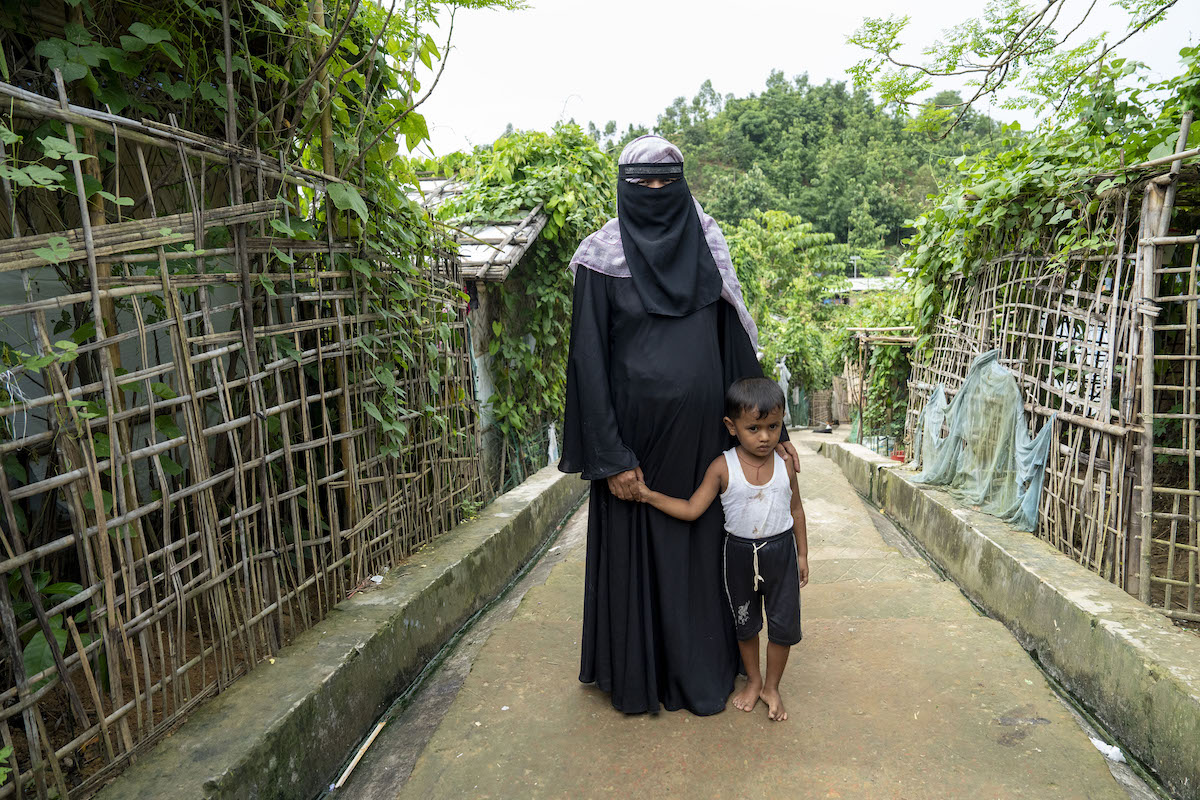 Rihana* (28) with her child in her yard in Cox's Bazar. Photo: Saikat Mojumder/Concern Worldwide