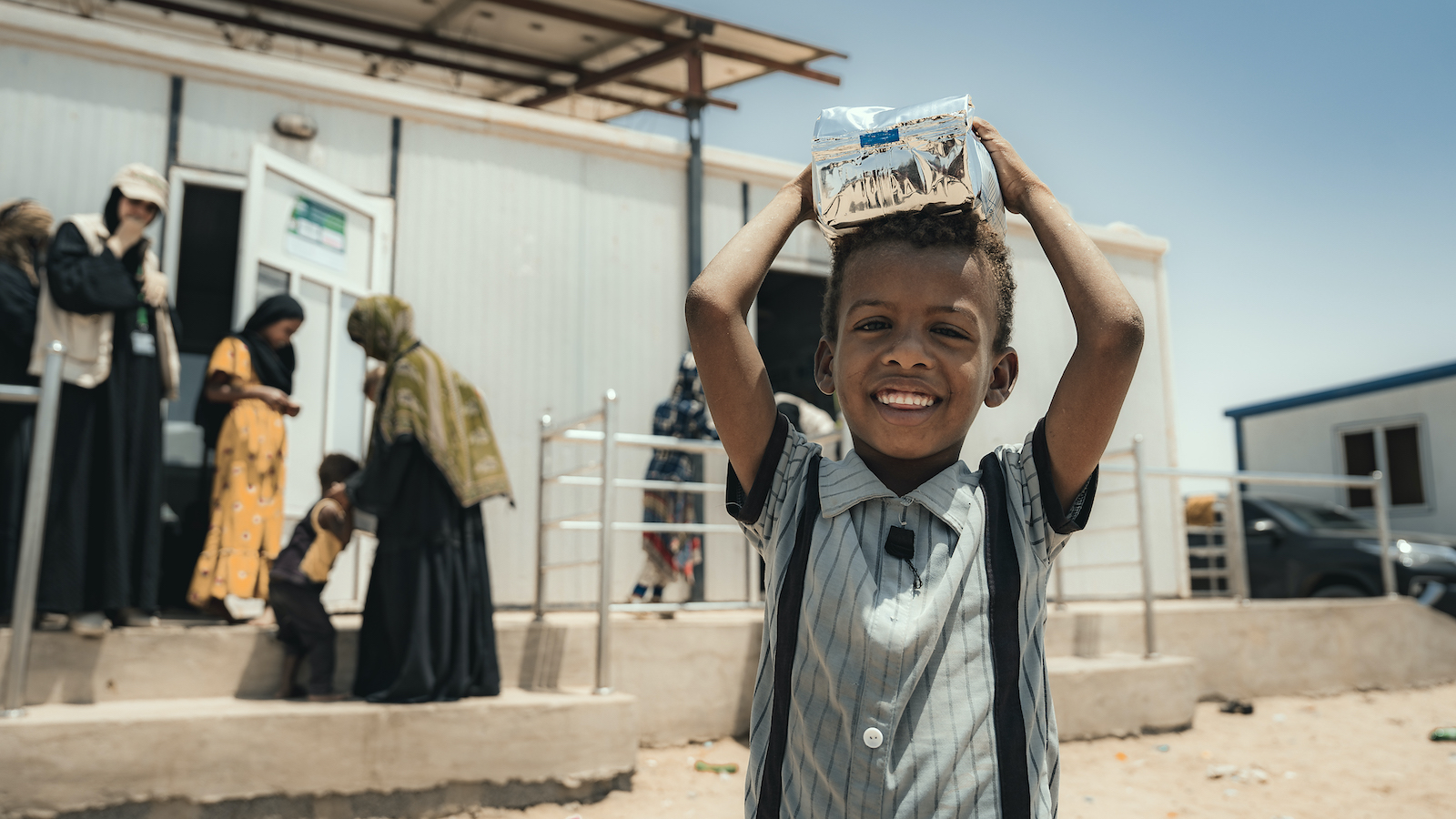 Cairo* receives nutritional supplementary food from the Concern-supported health clinics in Tuban district. (Photo: Concern Worldwide)