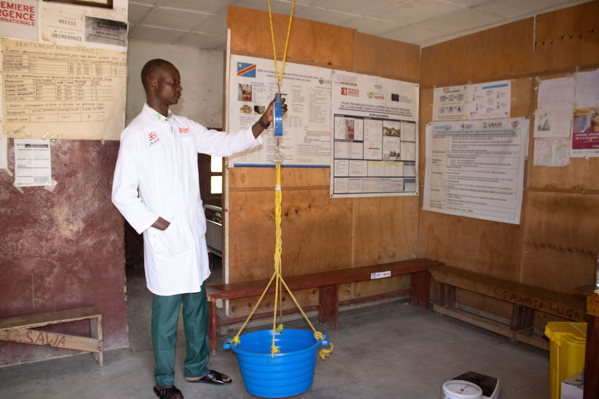 Matthieu*, head nurse at the Awasi Health Center, treats children and adults with support from the EAST program.