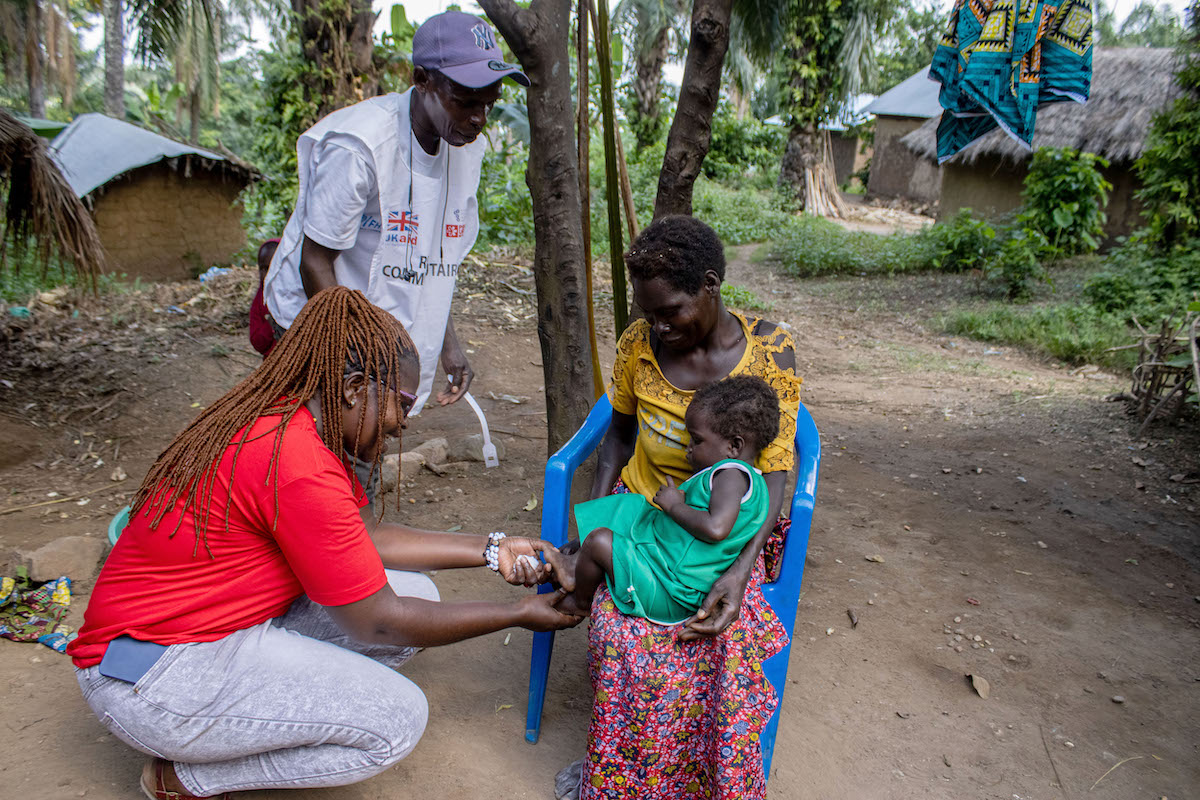 Nurses with the EAST consortium screen for malnutrition at the Awasi Health Center. 